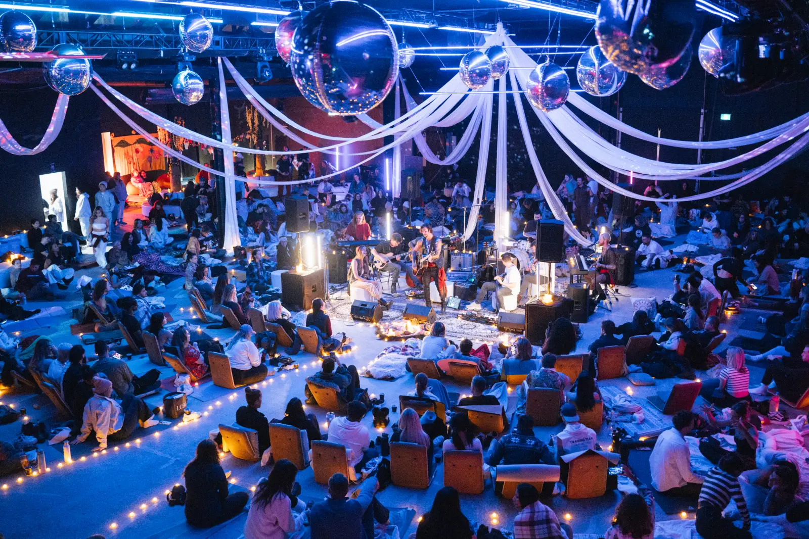 Overhead view of the live band performing at the centerpiece, video still