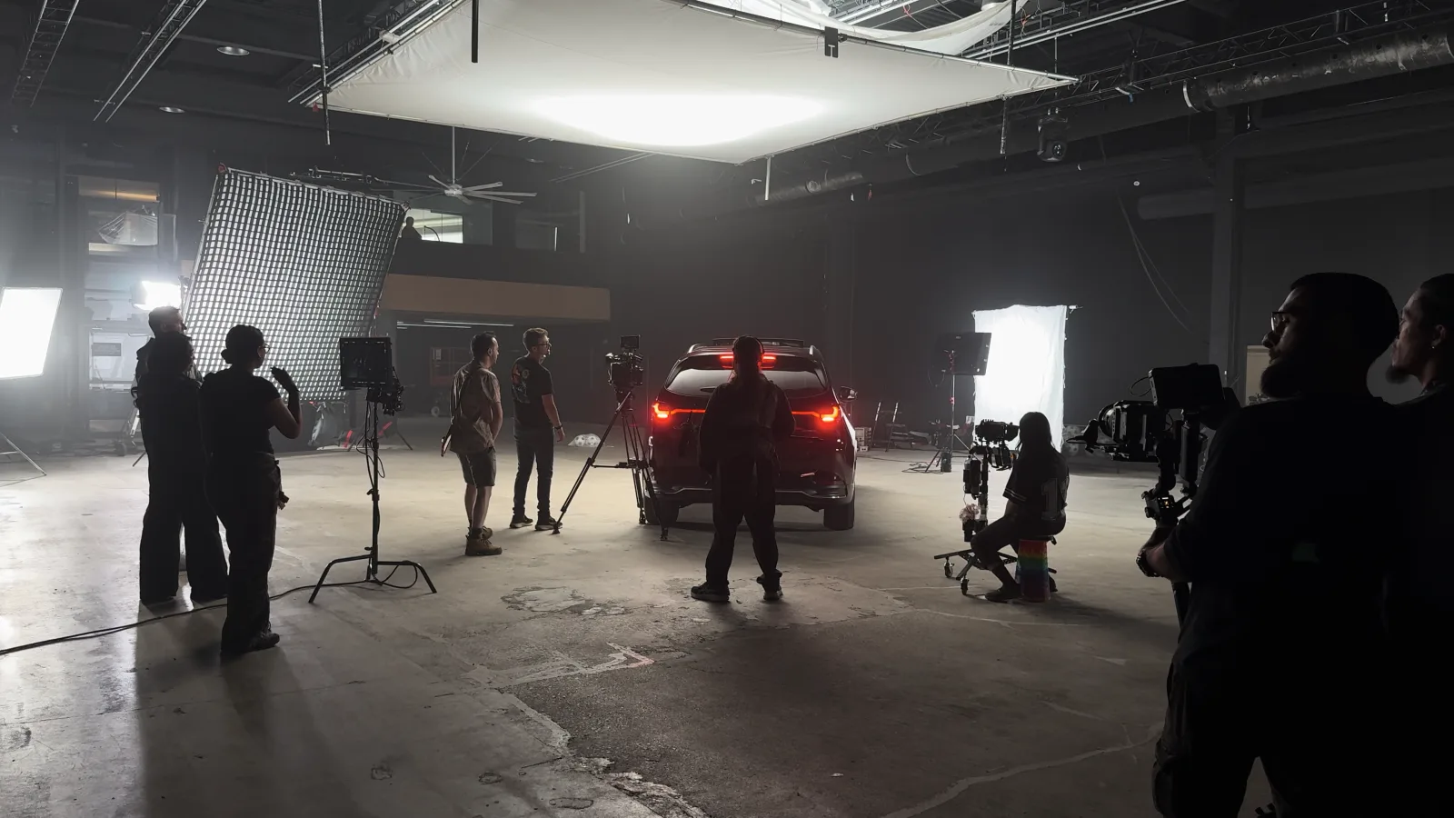 A commercial shoot in production at Demo Room, full crew and lighting on set